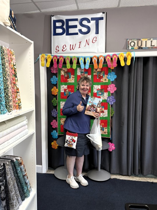 Florida Shop Hop 2026 visitor at Best Sewing & Vacuum's selfie booth, Jacksonville, FL.