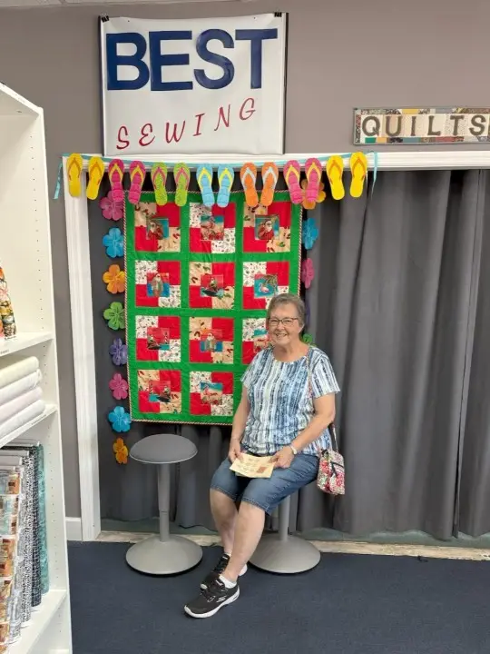 Florida Shop Hop 2026 visitor at Best Sewing & Vacuum's selfie booth, Jacksonville, FL.